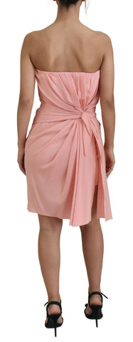 Pink silk strapless sheath dress by Dolce & Gabbana, form-fitting with smooth fabric and elegant design.