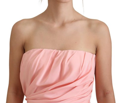 Pink silk strapless sheath dress by Dolce & Gabbana, form-fitting with a smooth, elegant design and minimal detailing.