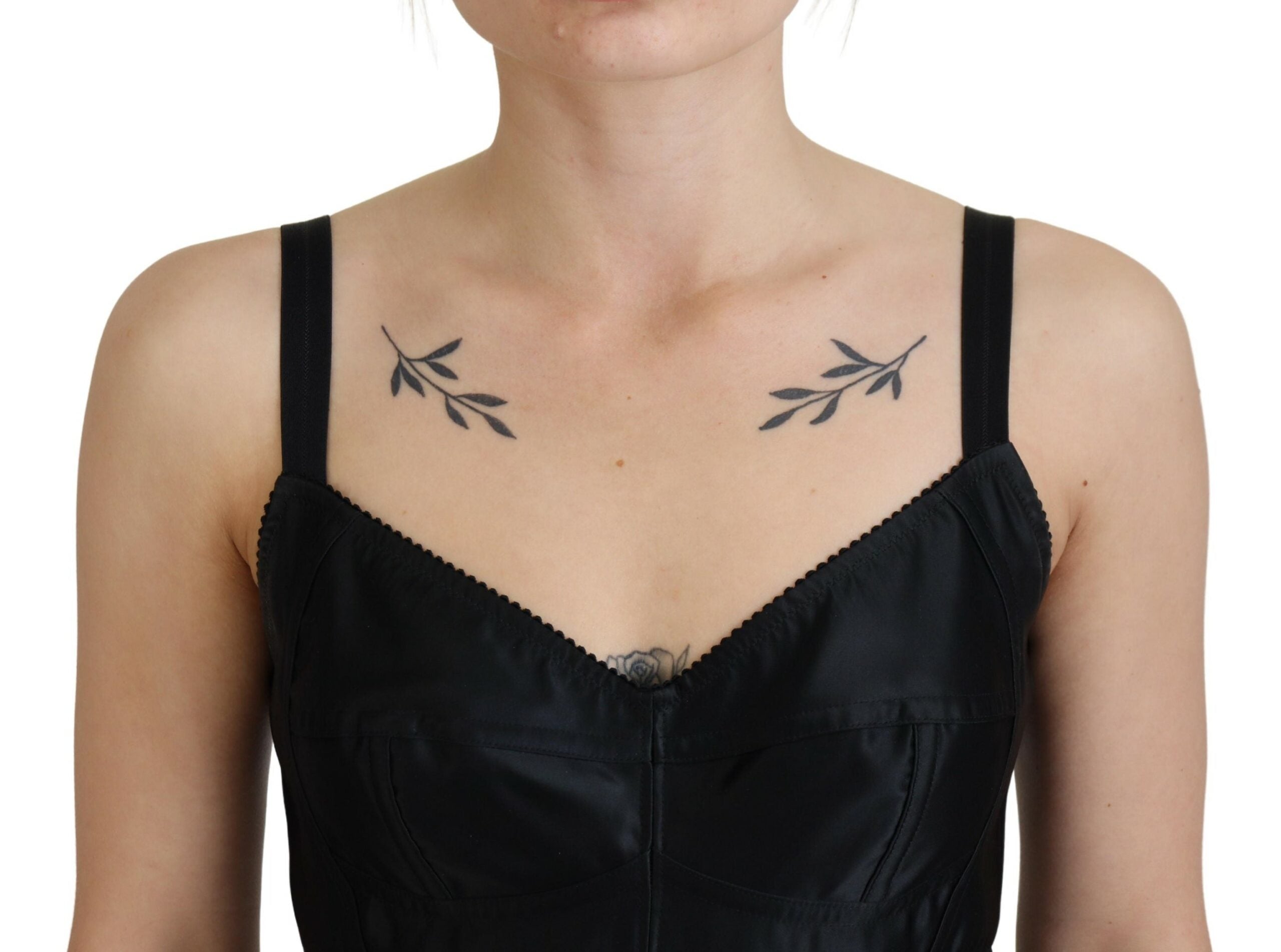 Black Fit Wool Stretch Sheath Mini Dress by Dolce & Gabbana, close-up of tailored fit and elegant design on a model.