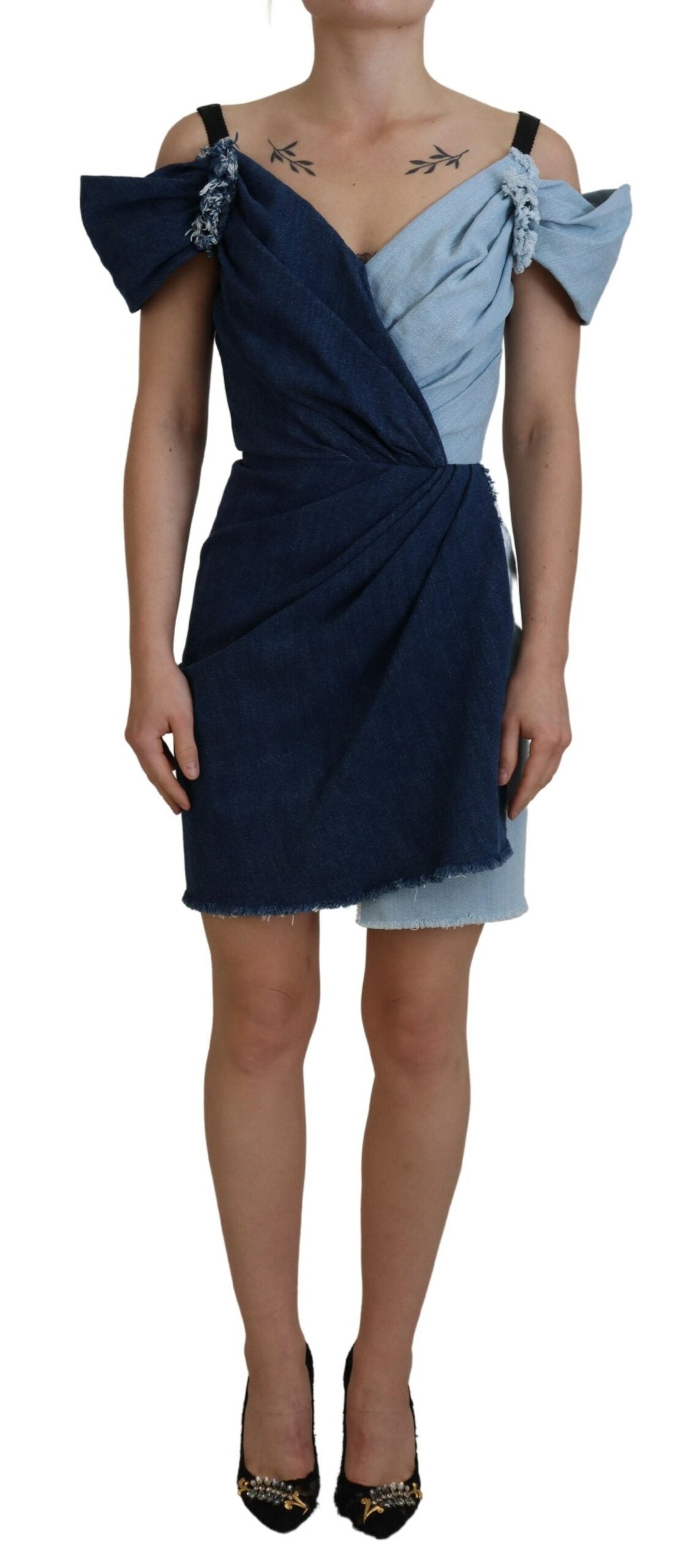 Two-tone blue patchwork denim mini dress by Dolce & Gabbana, featuring a stylish, fitted design with patchwork details.