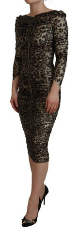Multicolor leopard print Dolce & Gabbana bodycon sheath midi dress, form-fitting with long sleeves and bold pattern.