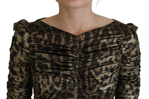 Multicolor leopard print Dolce & Gabbana bodycon sheath midi dress displayed on a hanger.