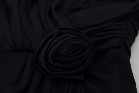 Black wrap sheath wool dress with one shoulder design by Dolce & Gabbana, elegant and form-fitting for formal occasions.