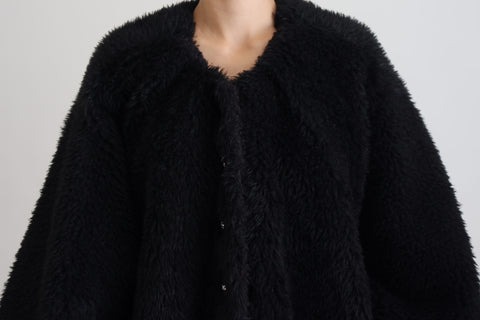 Black Dolce & Gabbana cashmere blend faux fur coat jacket with a plush, luxurious texture and elegant design.