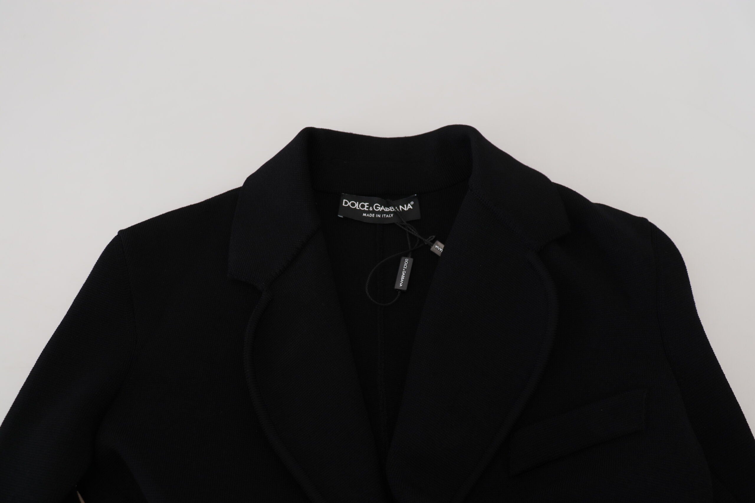 Black button cardigan blazer by Dolce & Gabbana, Viscose jacket with structured fit and classic design, shown on a model.
