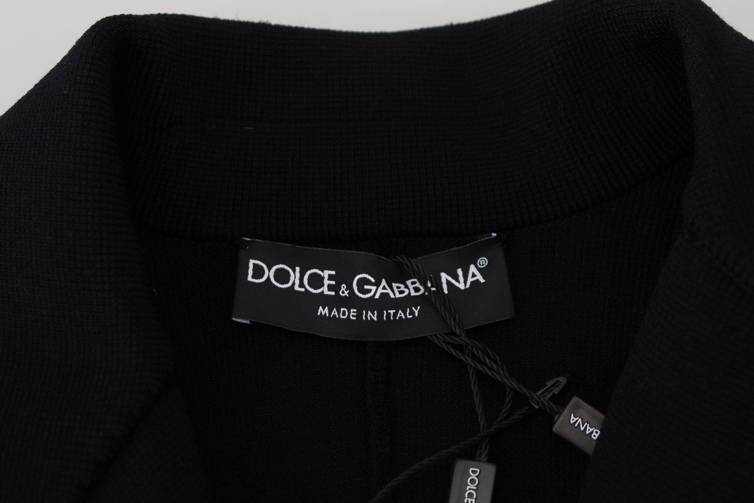 Black button cardigan blazer by Dolce & Gabbana, viscose jacket with tailored fit and classic design, visible front buttons and collar.