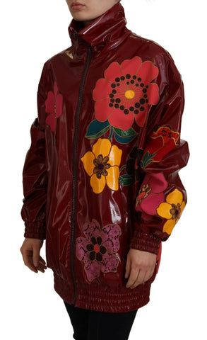 Maroon floral full-zip polyester women's jacket by Dolce & Gabbana, featuring a stylish floral pattern and front zipper.