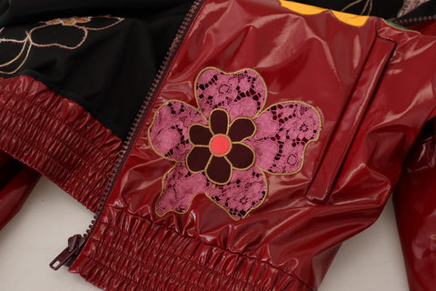 Maroon floral full-zip polyester women's jacket by Dolce & Gabbana, featuring a stylish floral pattern and front zipper.