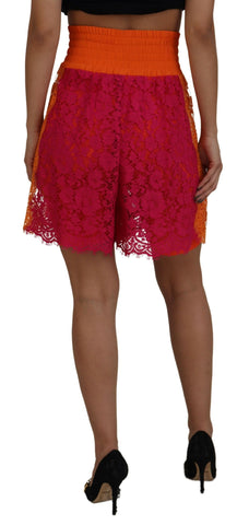 Pink orange lace cotton high waist shorts by Dolce & Gabbana with intricate lace detailing and a stylish high-rise fit.