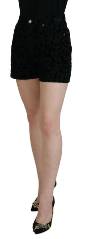 Black denim cotton stretch hot pants shorts by Dolce & Gabbana, showing fitted high-waisted design with classic stitching details.