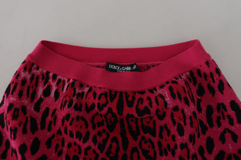 Pink leopard print high waist A-line mini skirt by Dolce & Gabbana, showcasing the bold pattern and stylish fit.