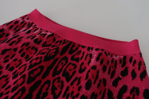 Pink leopard print high waist A-line mini skirt by Dolce & Gabbana, featuring bold animal pattern and stylish fit.