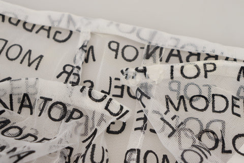 White see-through A-line mini skirt with Dolce & Gabbana logo, stylish and lightweight, showcasing a fashionable and modern design.