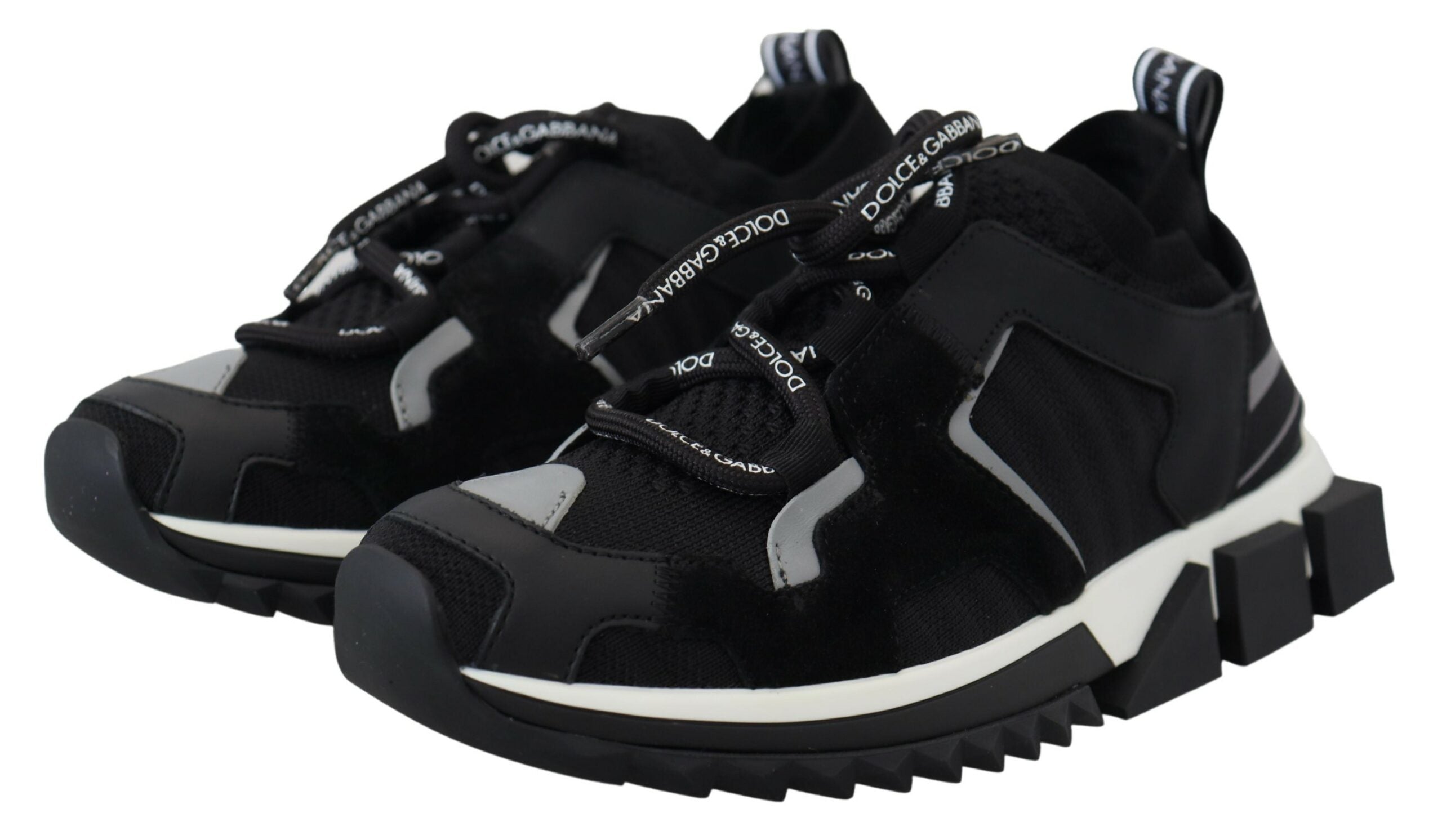 Black mesh Sorrento trekking sneakers by Dolce & Gabbana with rugged soles and sporty design for outdoor activities.