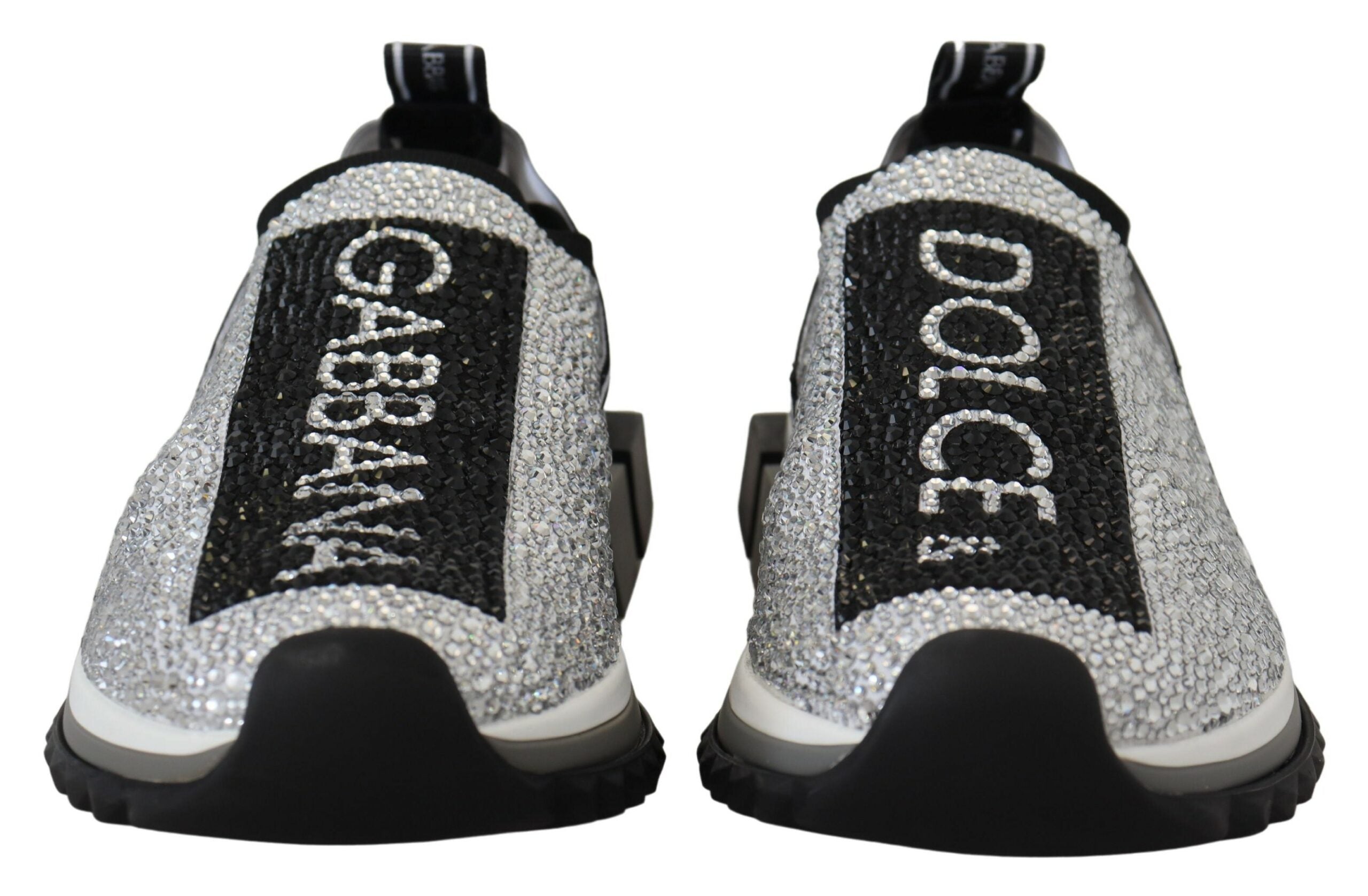 Silver rhinestone Sorrento sneakers by Dolce & Gabbana with sparkling embellishments and white rubber soles.