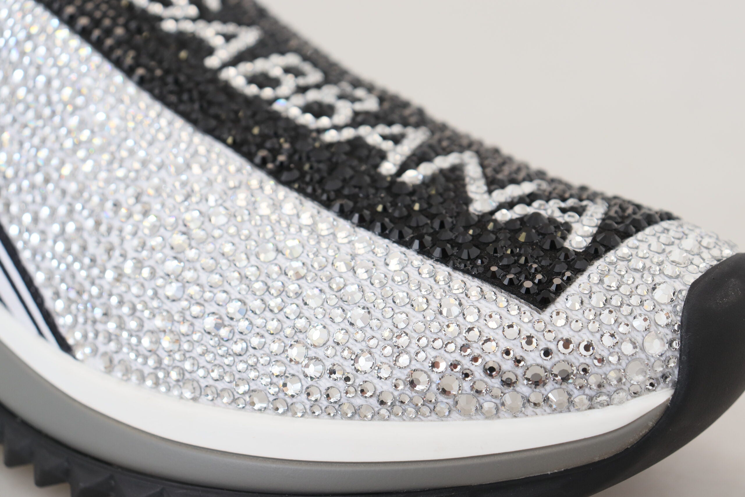 Dolce & Gabbana Silver Rhinestones Sorrento Sneakers with sparkling embellishments and white rubber soles.