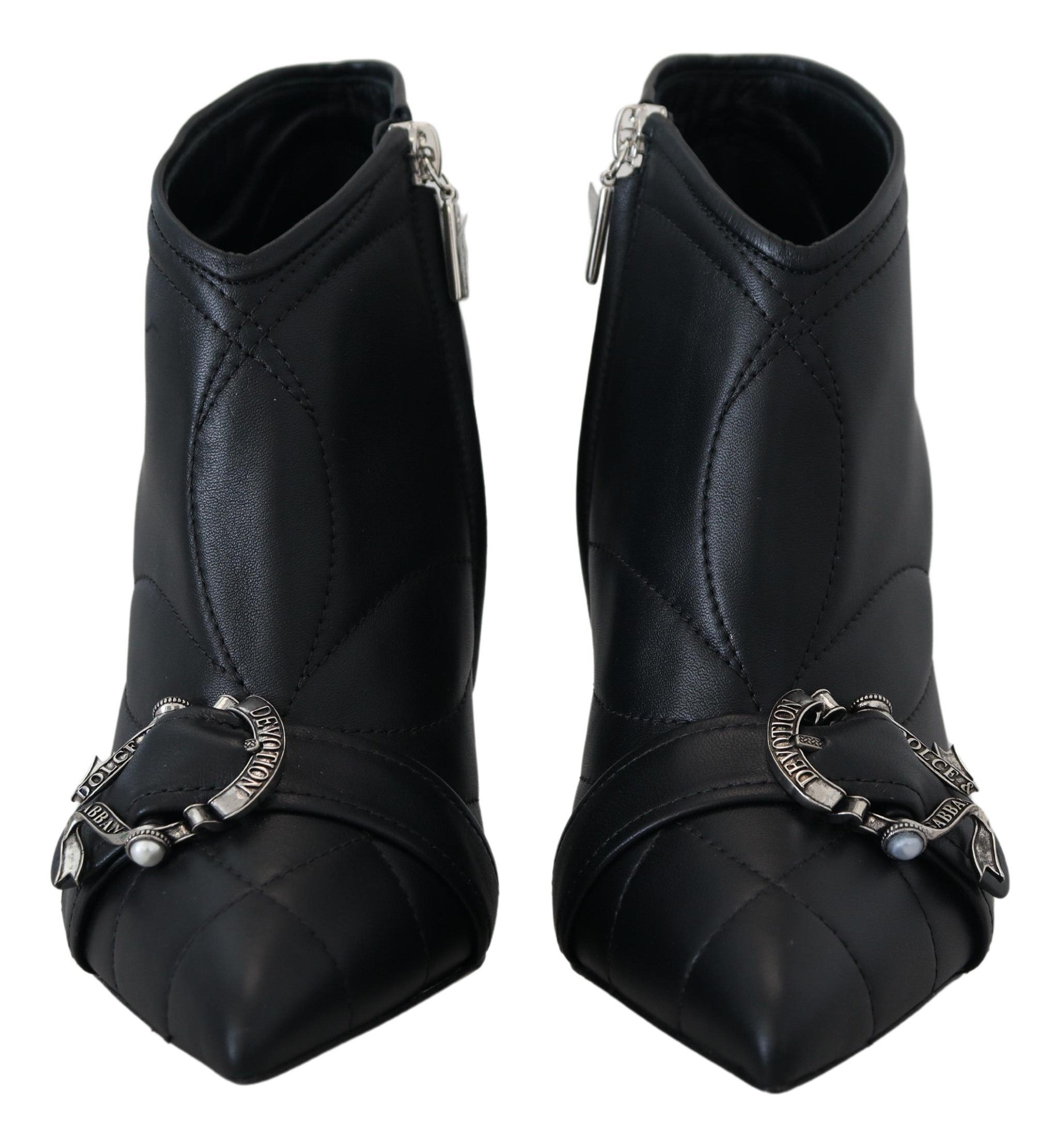 Black Devotion quilted buckle ankle boots by Dolce & Gabbana with pointed toe and chunky heel, featuring side buckle detail.