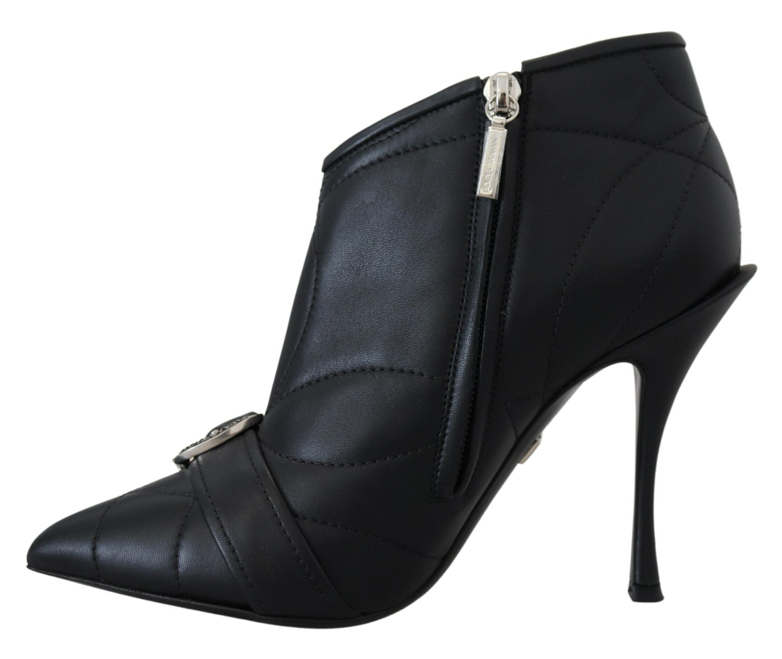 Black Devotion quilted buckled ankle boots by Dolce & Gabbana, featuring a stylish quilted design and buckle accents.