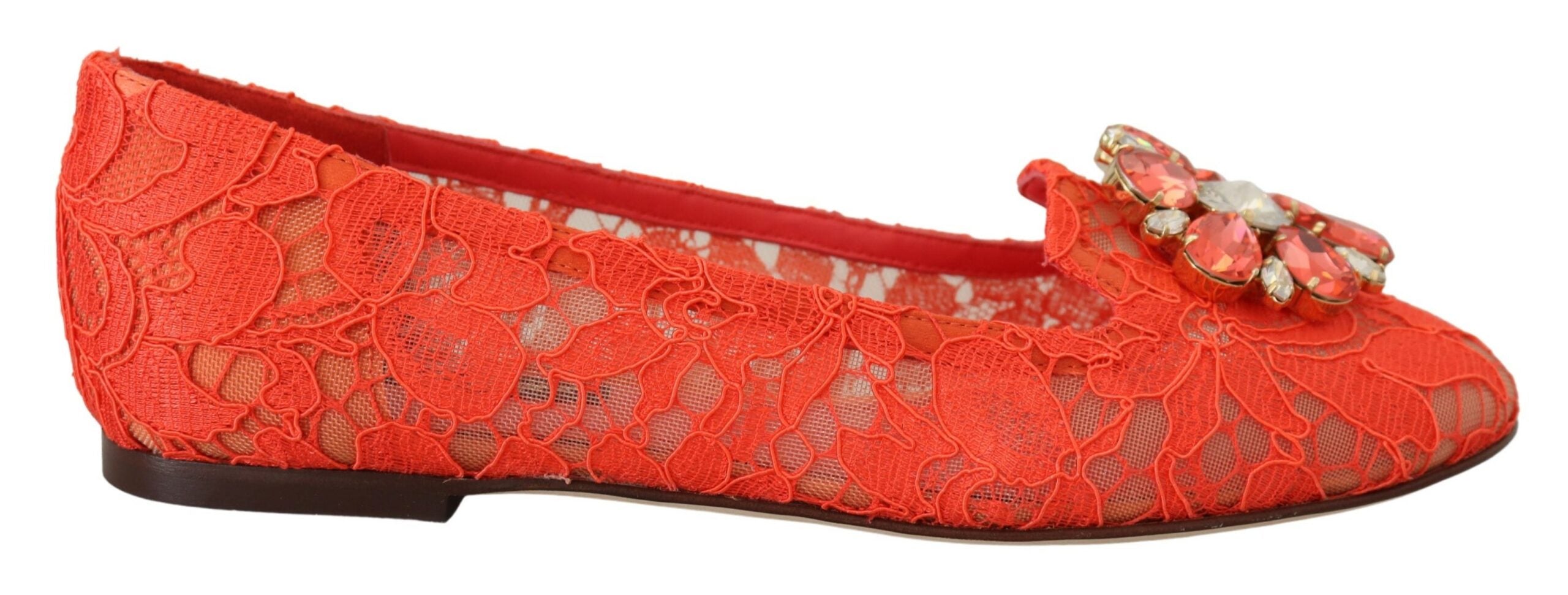 Red Taormina lace ballet flats with crystal embellishments by Dolce & Gabbana, showing their elegant design and intricate details.