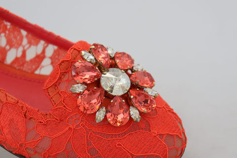Red Taormina lace ballet flats with crystal embellishments by Dolce & Gabbana, featuring a elegant, feminine design.