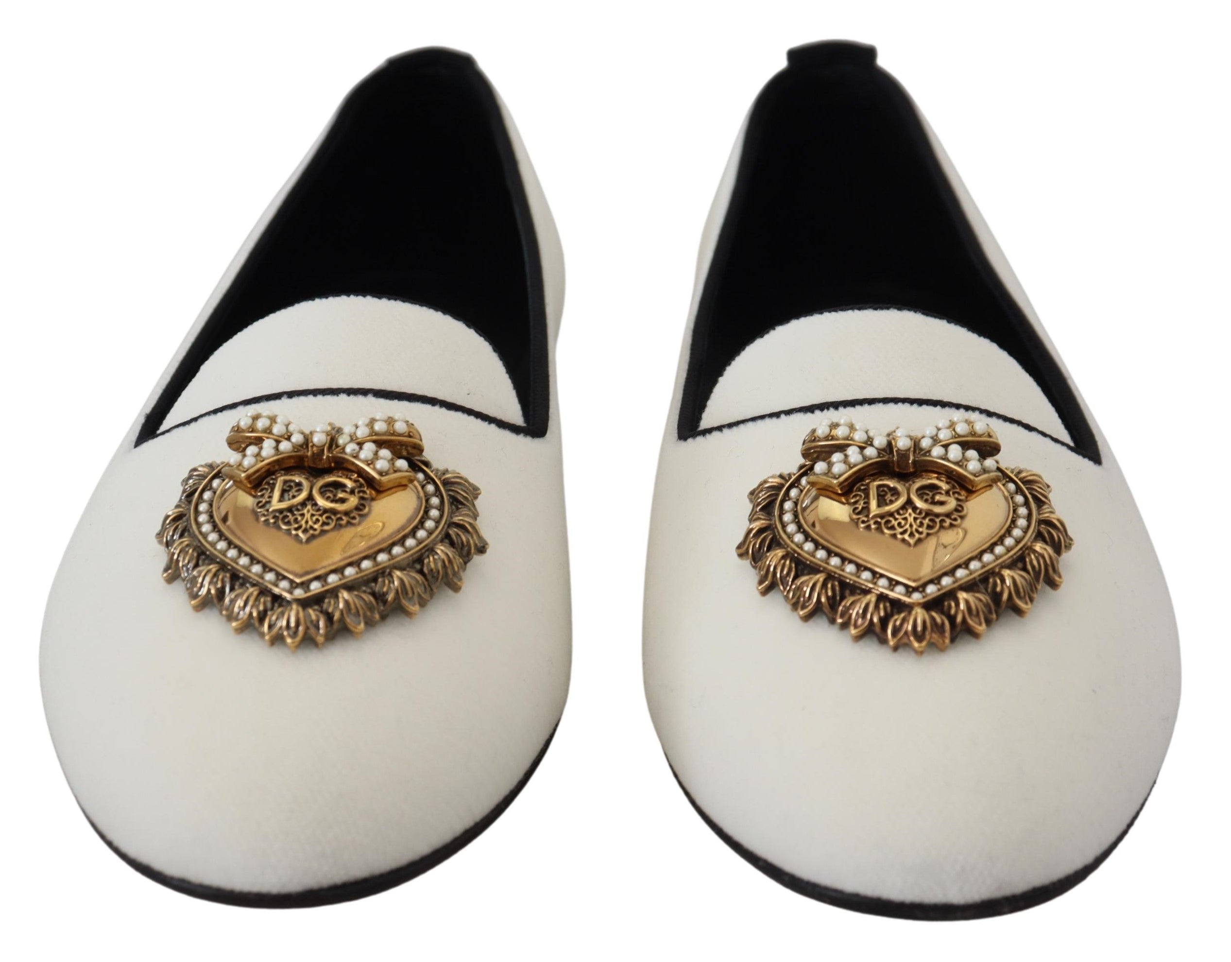 White velvet slip-on loafers by Dolce & Gabbana, showcasing sleek flats with a smooth, luxurious texture and stylish design.