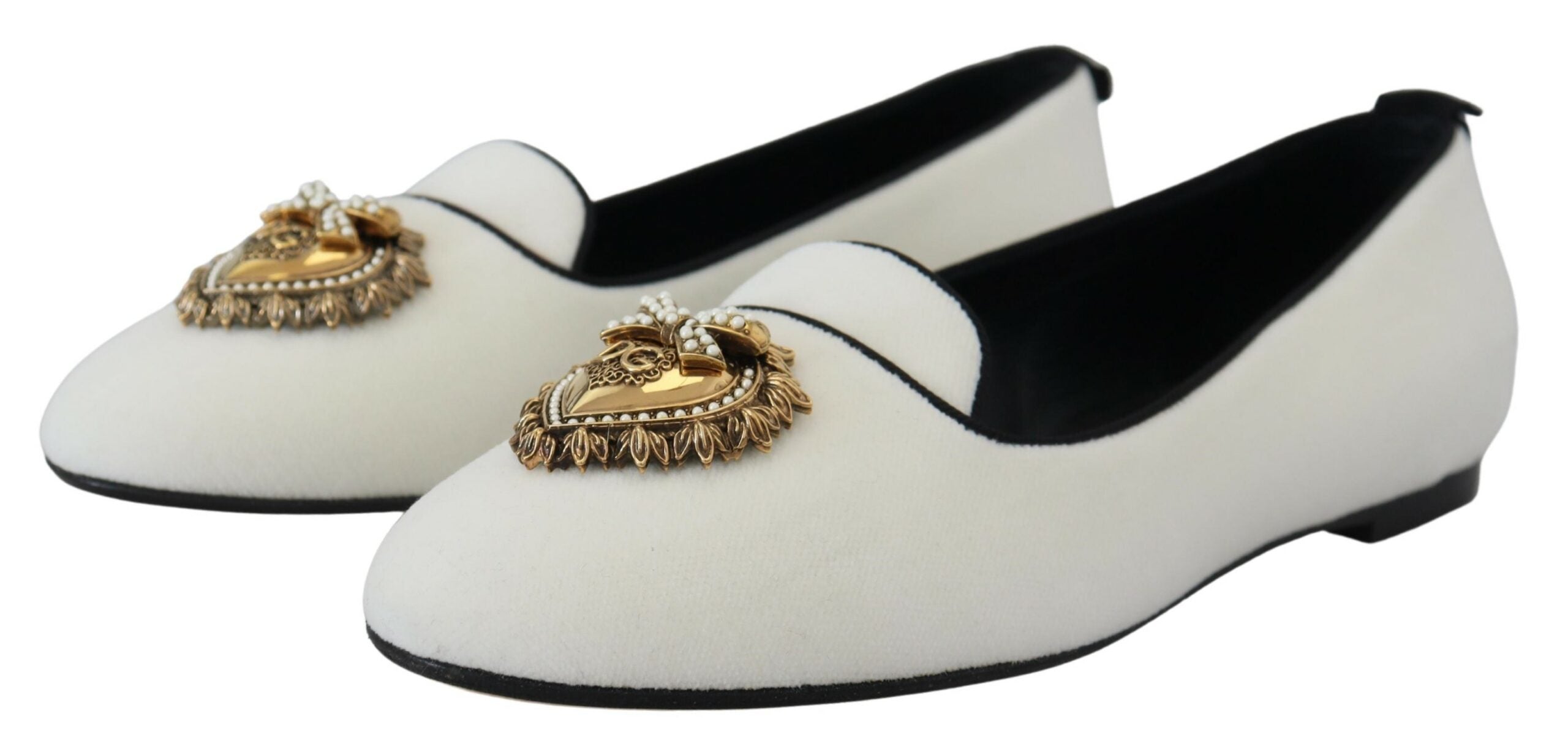 White velvet slip-on loafers by Dolce & Gabbana with a sleek, flat design and minimal detailing, ideal for stylish casual wear.