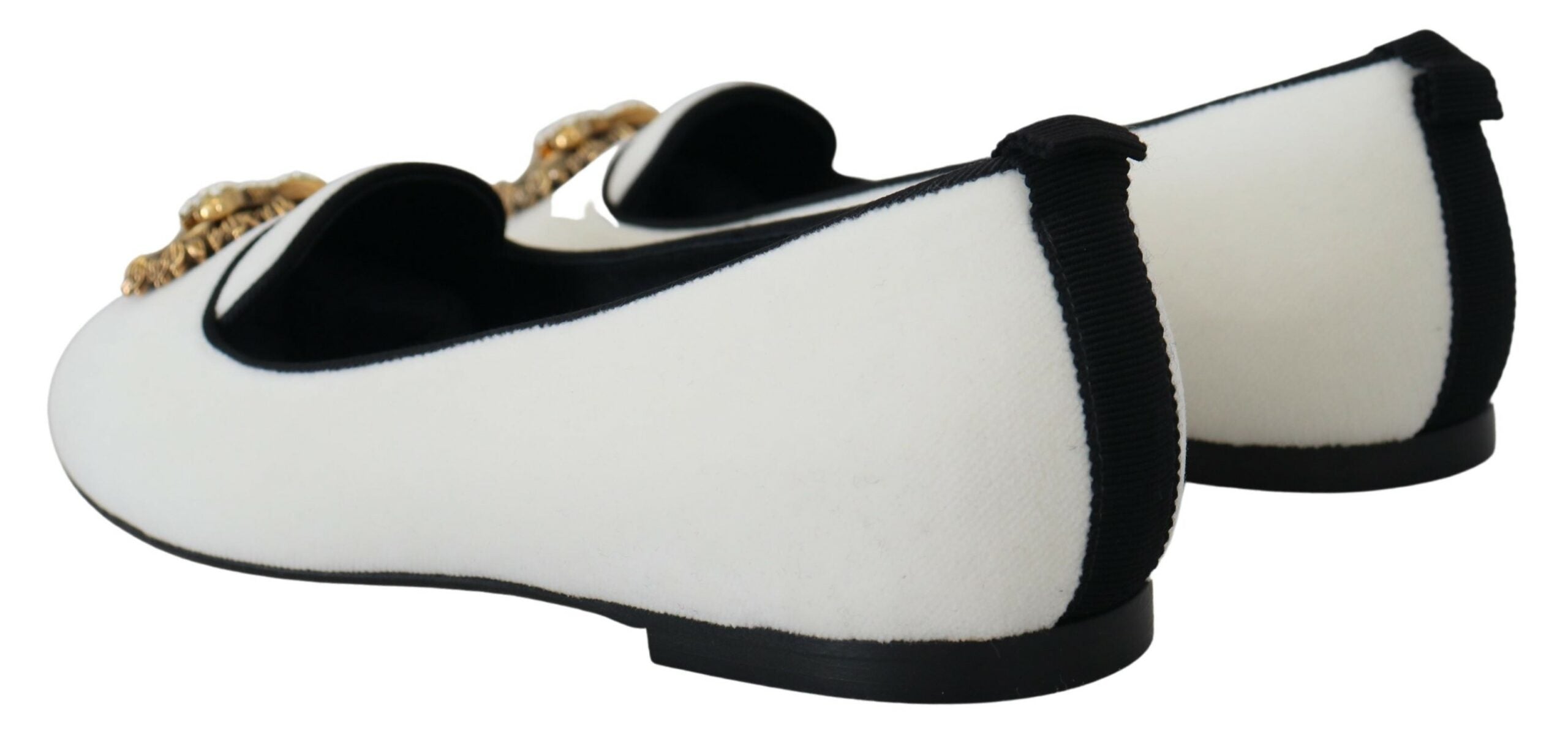 White velvet slip-on loafers from Dolce & Gabbana with a sleek, flat design and minimalistic style.