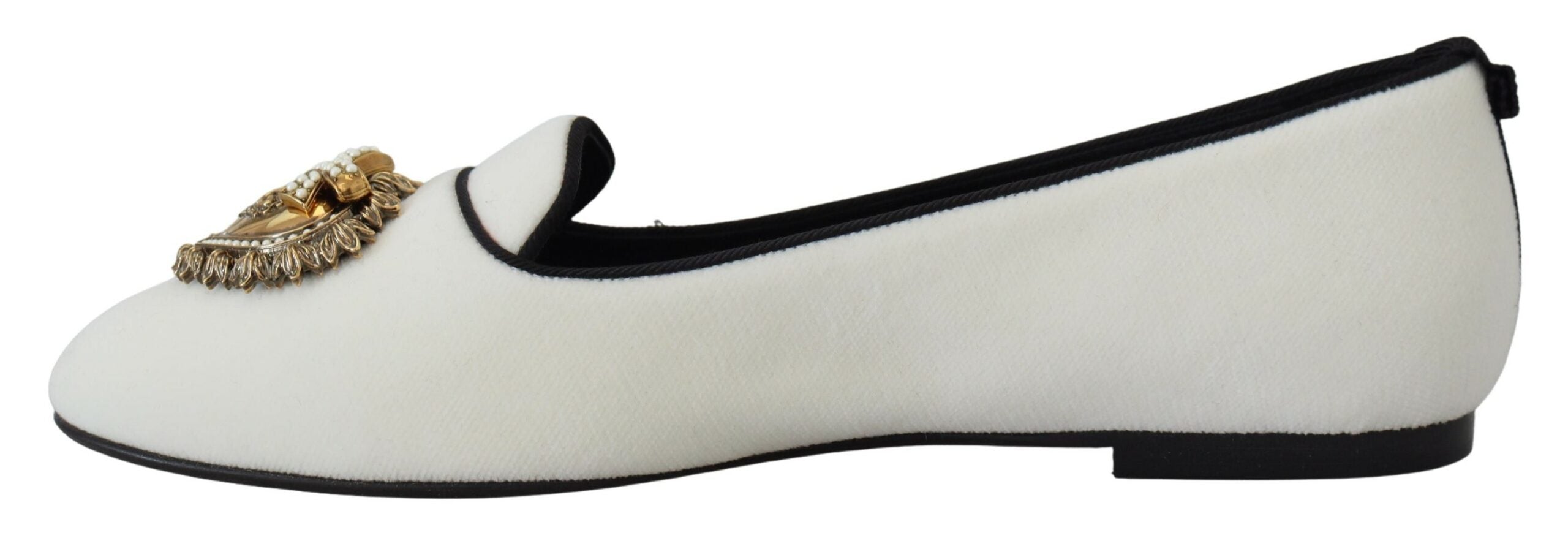 White velvet slip-on loafers from Dolce & Gabbana, showcasing sleek flats with a smooth finish and elegant design.
