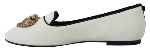White velvet slip-on loafers from Dolce & Gabbana, showcasing sleek flats with a smooth finish and elegant design.