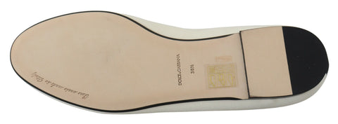 White velvet slip-on loafers by Dolce & Gabbana, stylish flats shoes with a smooth finish and sleek design.
