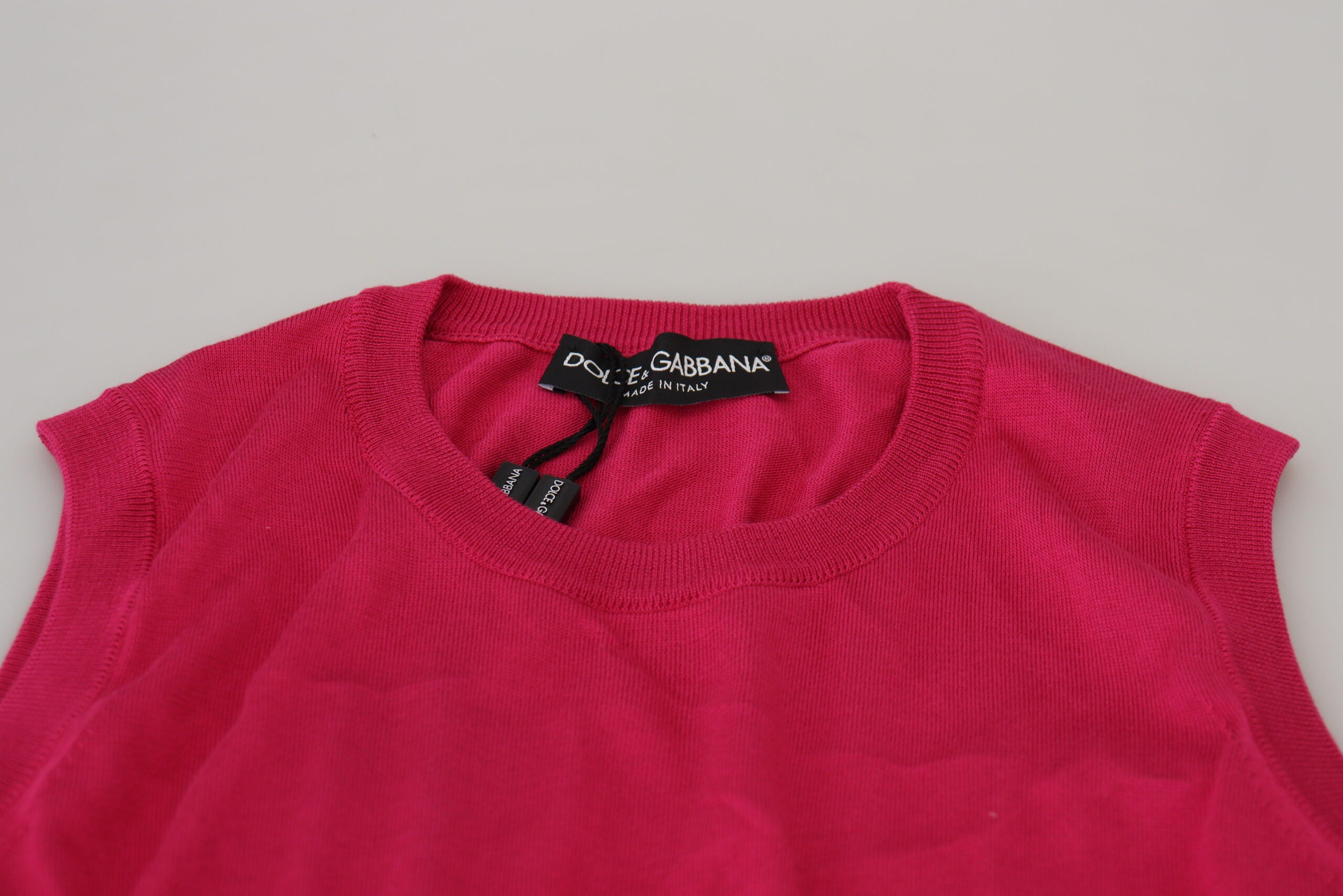 Pink silk vest pullover crewneck tank top by Dolce & Gabbana, featuring a smooth, elegant fabric and classic sleeveless design.