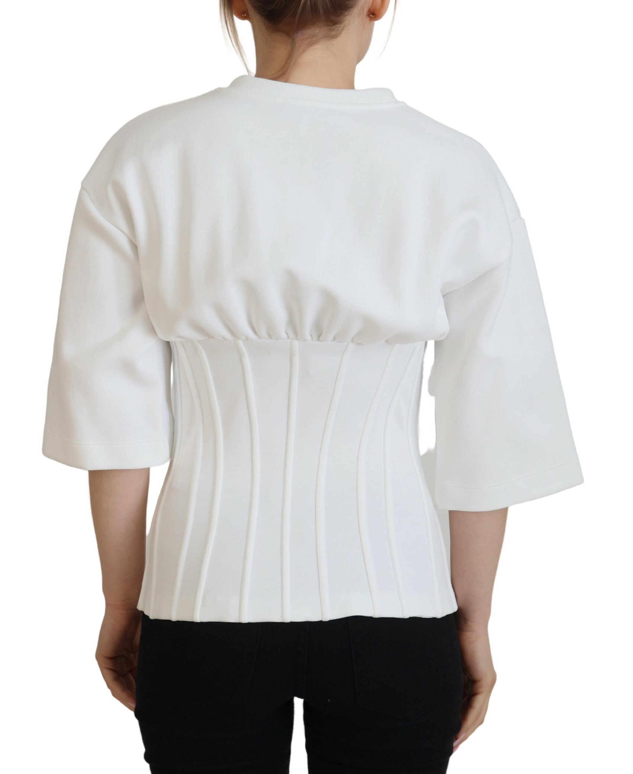 White Dolce & Gabbana cotton corset-style stretch top with fitted design and sleeveless T-shirt silhouette.