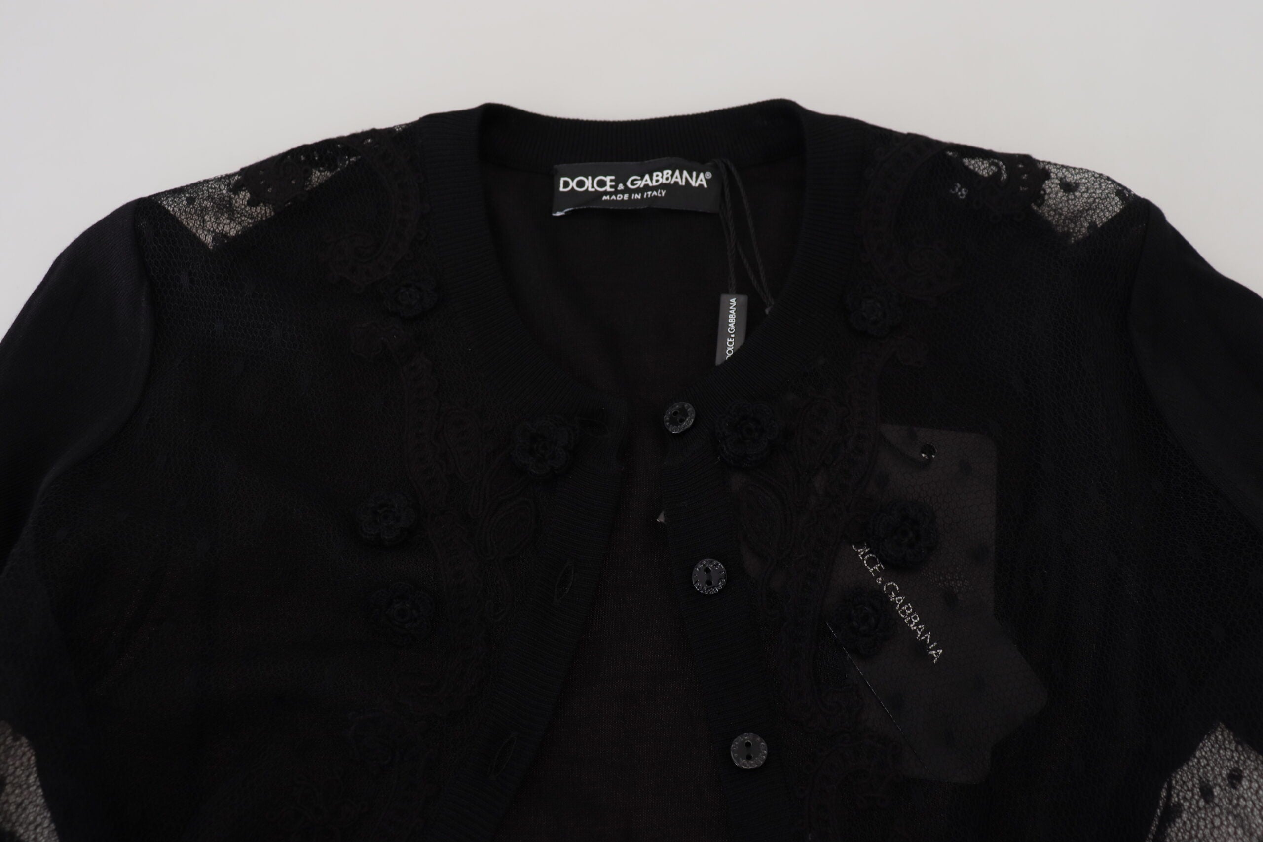 Black floral lace button cardigan sweater by Dolce & Gabbana, featuring intricate lace details and a classic button-up design.