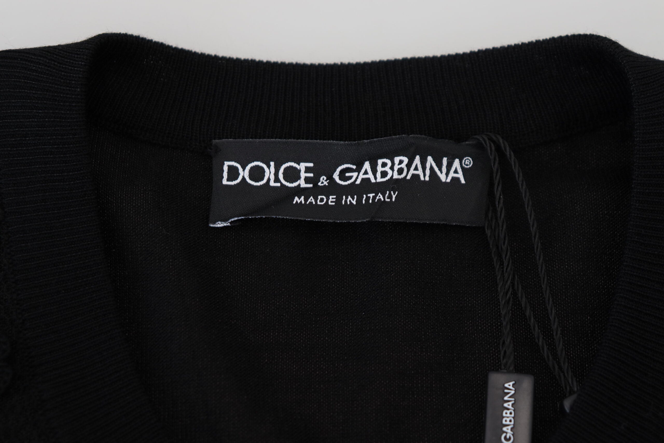 Black floral lace button cardigan sweater from Dolce & Gabbana with intricate lace details and classic button closure.