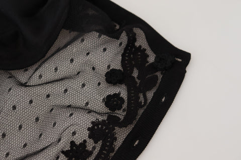 Black floral lace cardigan sweater from Dolce & Gabbana with button front and intricate lace detailing.