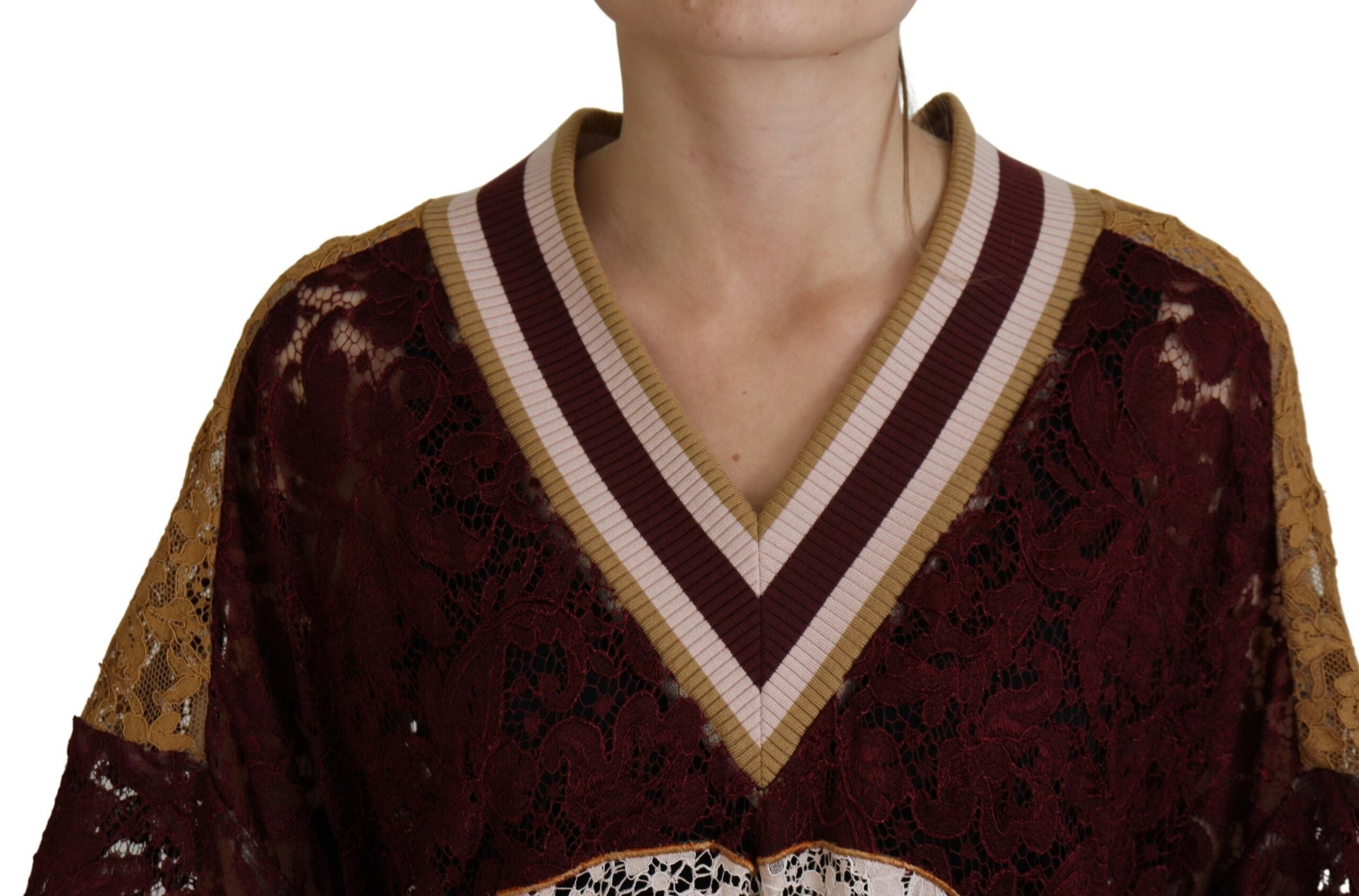 Multicolor lace V-neck pullover sweater by Dolce & Gabbana shown on a model, featuring intricate lace details and vibrant colors.