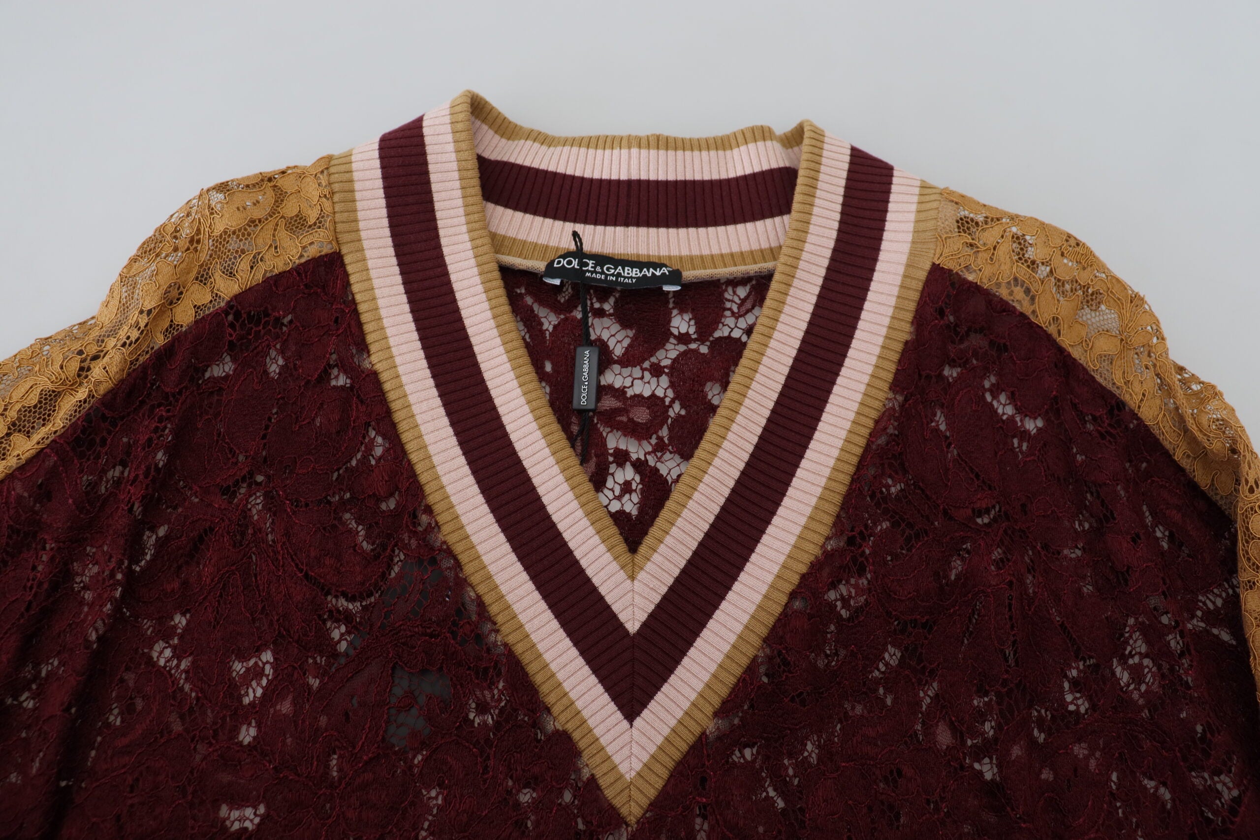 Multicolor lace V-neck pullover sweater by Dolce & Gabbana, featuring intricate lace details and vibrant color pattern.