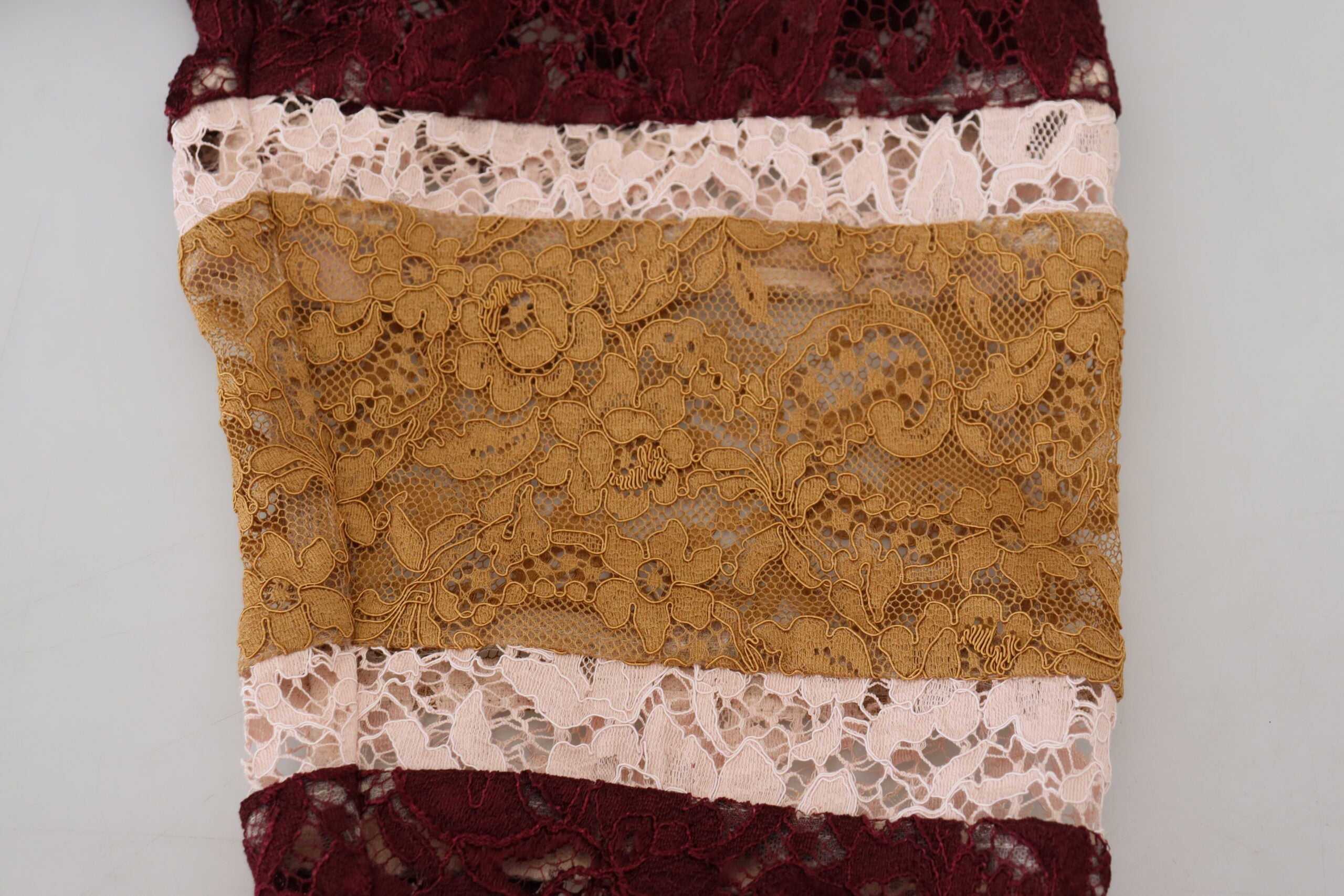 Multicolor lace V-neck Dolce & Gabbana pullover sweater featuring intricate lace details and a stylish V-neck design.