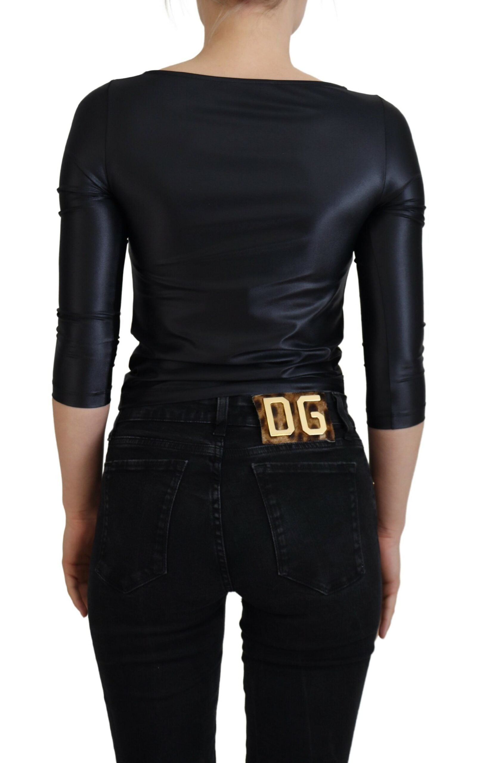 Black cotton stretch open chest 3/4 sleeve top by Dolce & Gabbana, showing the fitted design and stylish neckline.
