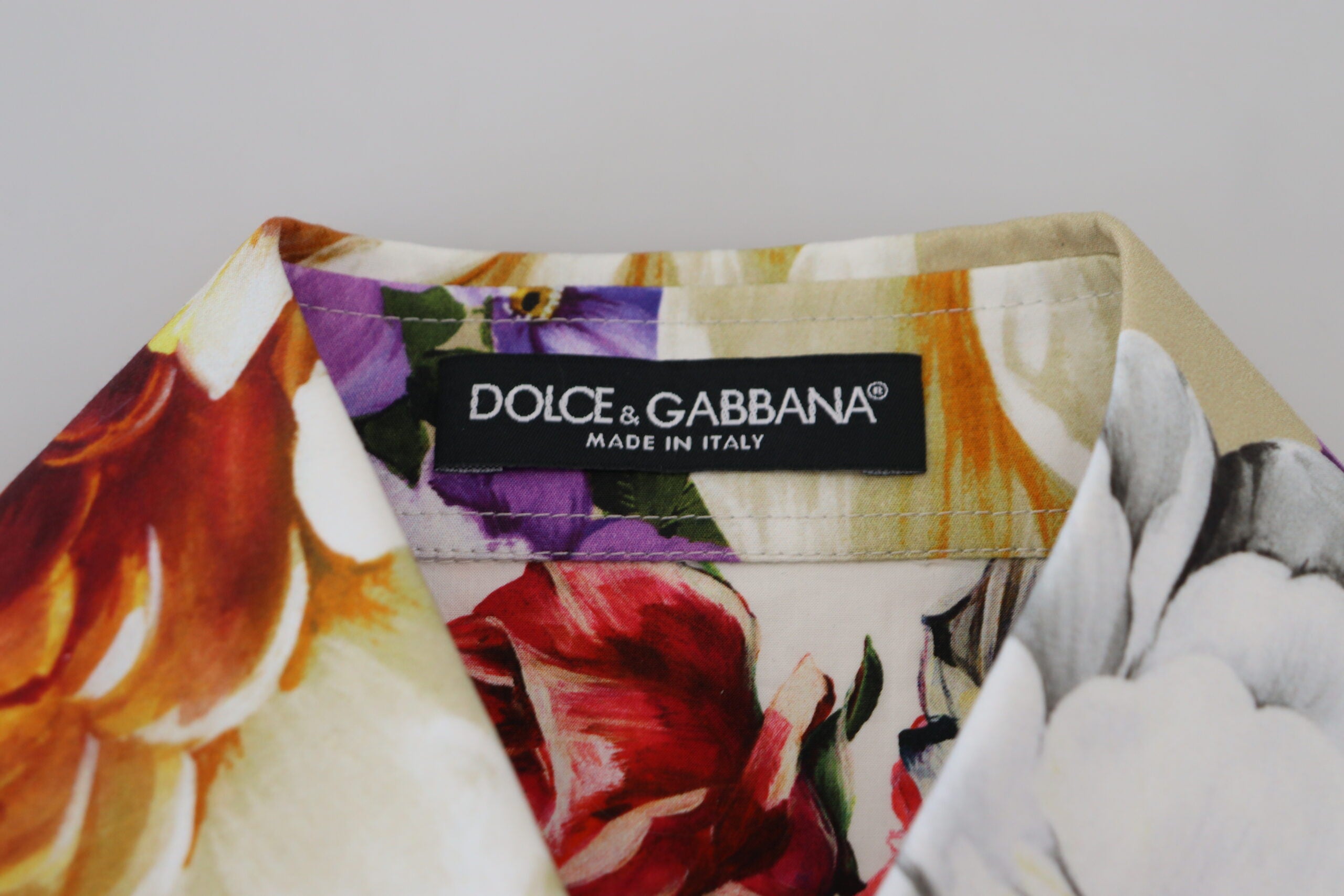 Multicolor floral cotton blouse with collar from Dolce & Gabbana, featuring vibrant flower patterns and a classic fit.