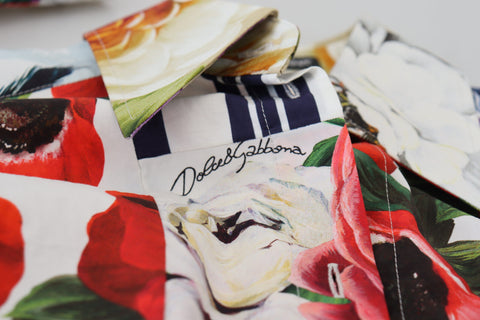 Multicolor floral cotton blouse with a collar from Dolce & Gabbana, featuring vibrant floral patterns and a tailored design.
