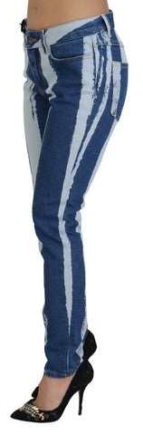Cobalt blue Dolce & Gabbana skinny denim jeans with white stripe pattern, made of cotton, close-up of front view.