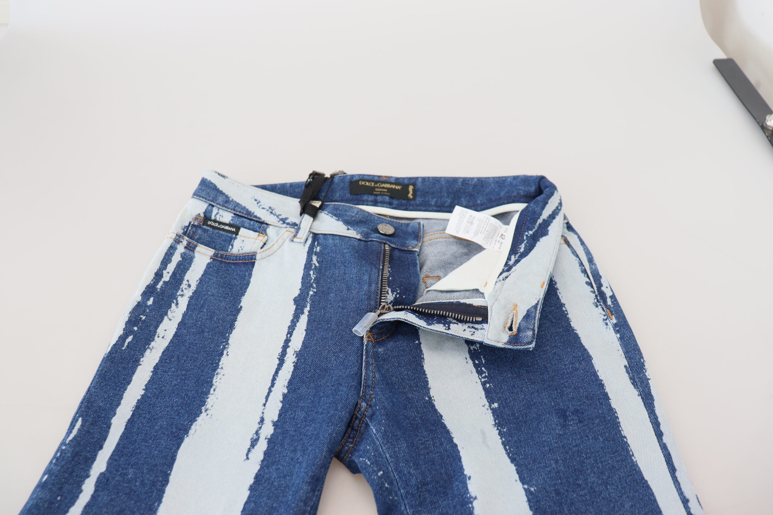 Cobalt blue striped skinny denim jeans by Dolce & Gabbana made of cotton, featuring a fitted silhouette and stylish design.