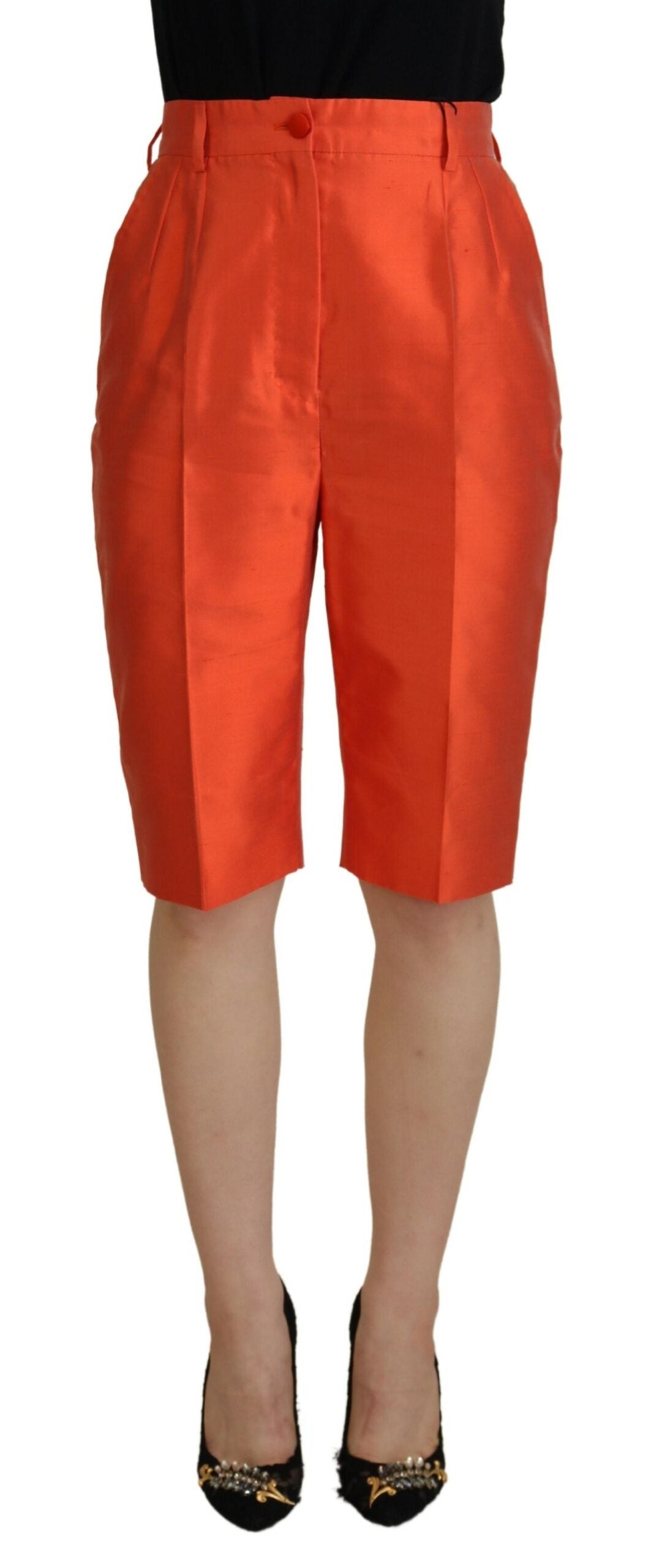 Orange silk high waist cropped pants by Dolce & Gabbana, with tailored fit and stylish design, shown on a model.