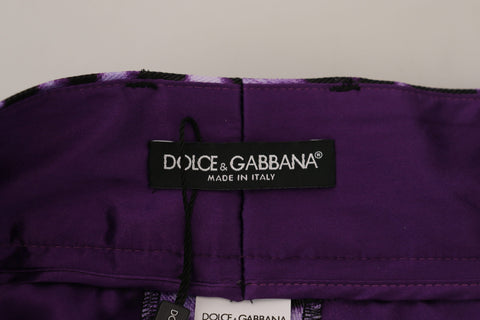 Purple leopard print high waist pants by Dolce & Gabbana, featuring a stylish and fitted design with a bold pattern.