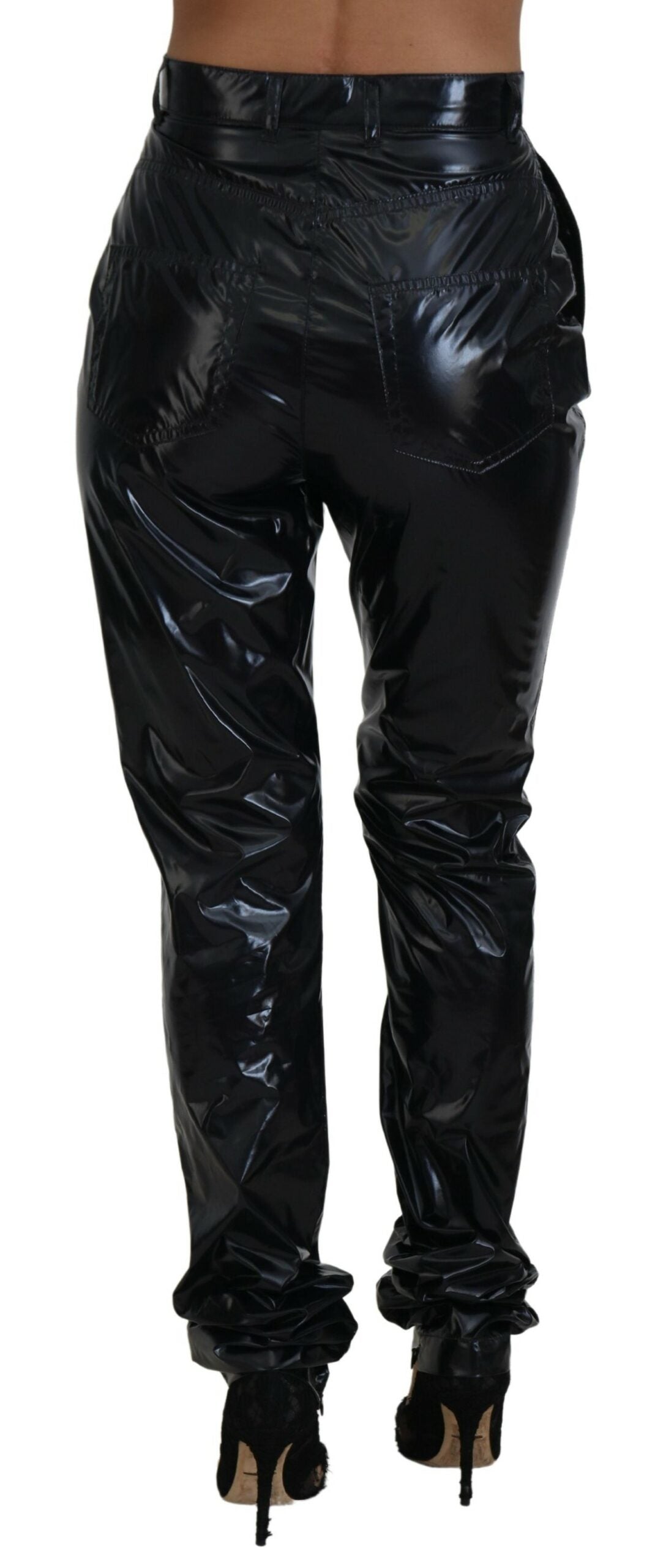 Black nylon high waist skinny pants from Dolce & Gabbana, close-up of fitted style and sleek fabric.