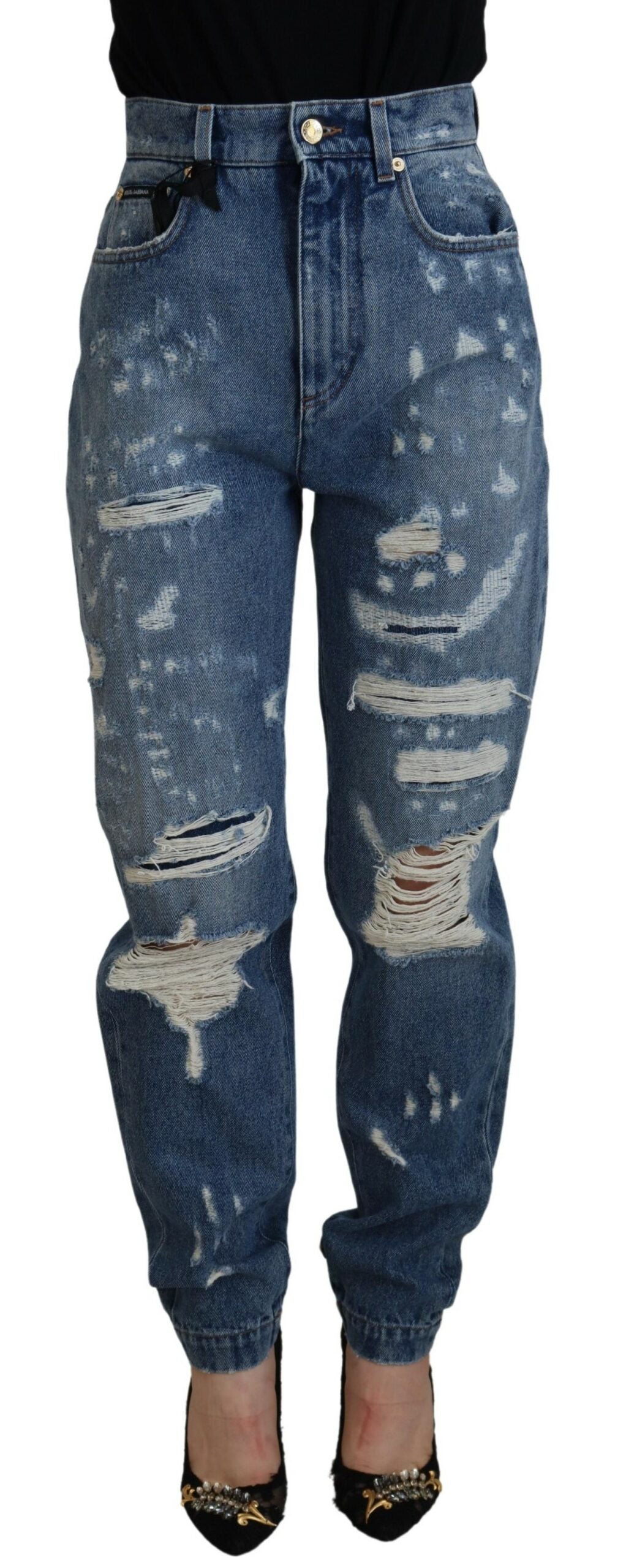 Blue tattered skinny denim cotton jeans by Dolce & Gabbana, showing distressed details and slim fit design.