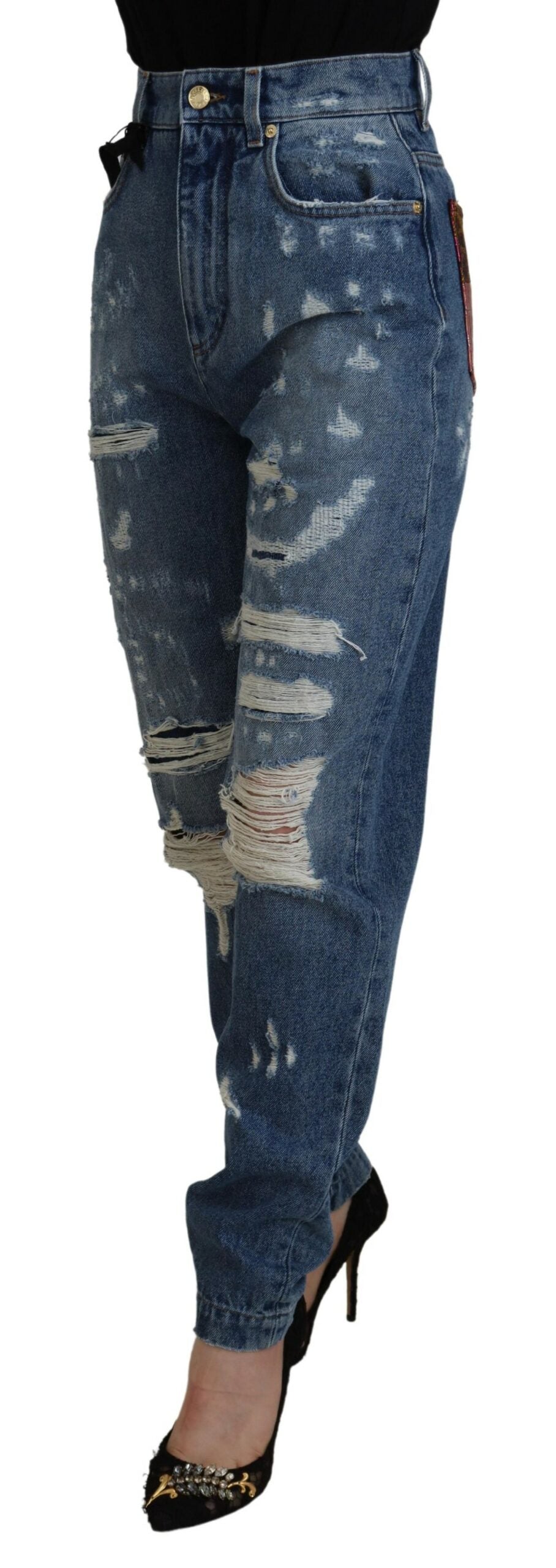 Blue tattered skinny denim jeans by Dolce & Gabbana, made of cotton, with distressed detailing and a fitted style.