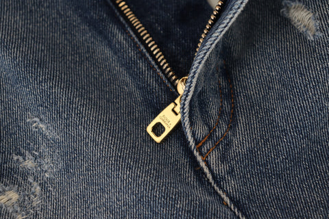 Blue tattered skinny denim cotton jeans by Dolce & Gabbana featuring distressed details and a fitted silhouette.
