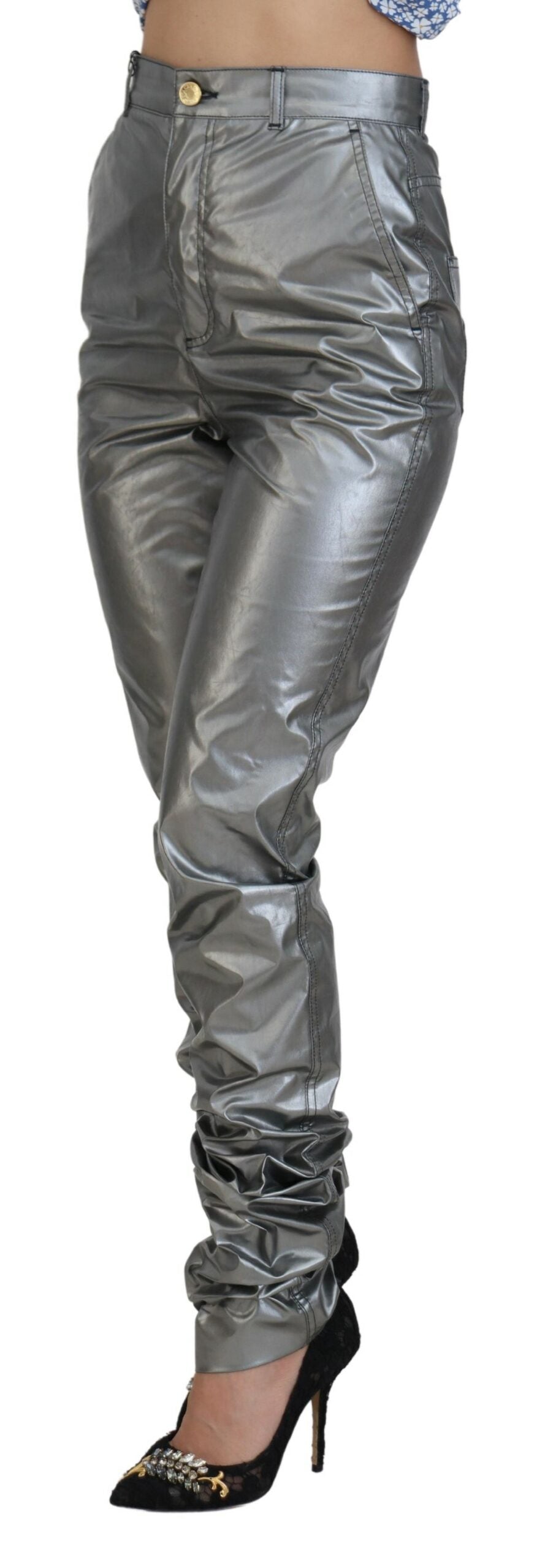 Metallic silver high waist skinny pants by Dolce & Gabbana, close-up of fitted pants with shiny metallic fabric.